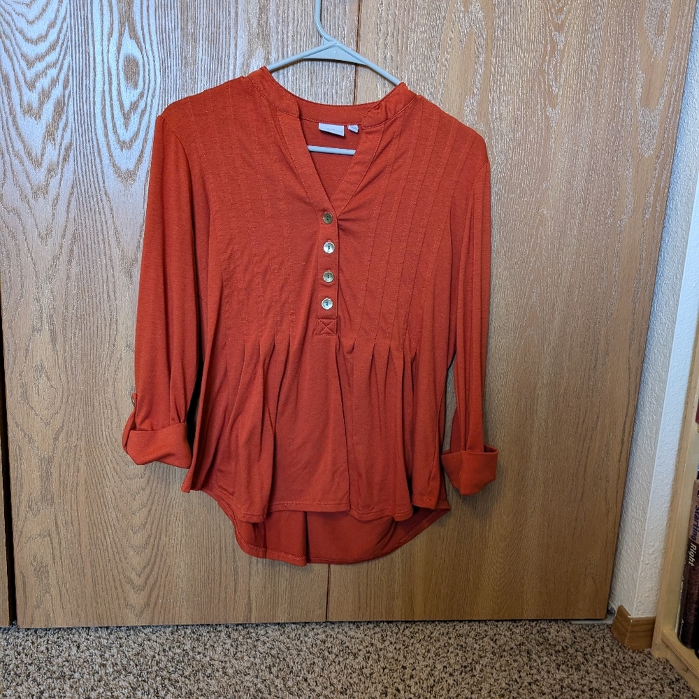 Woman's orange blouse